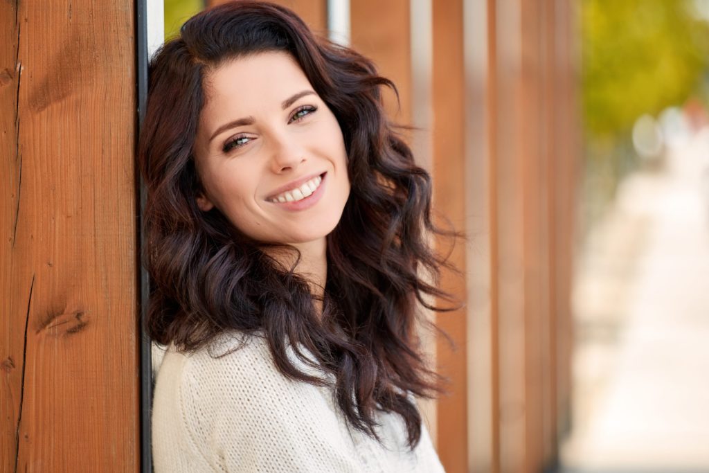 beautiful smiling woman in the park